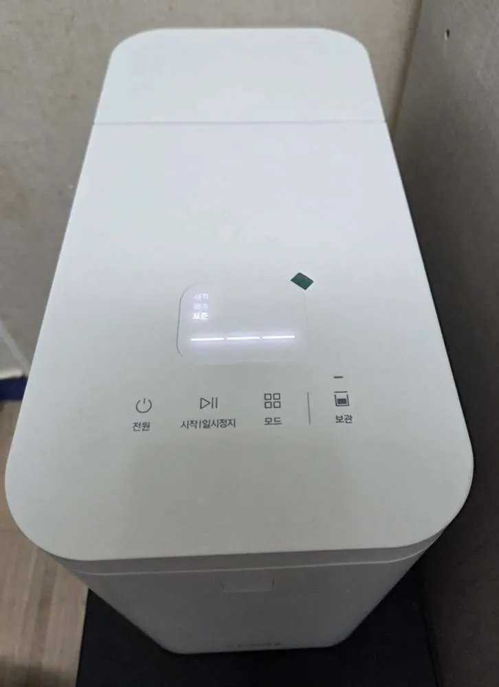 판교동 주방에 설치된 코웨이 제로 음식물 처리기 분쇄형 2L WMG-2005